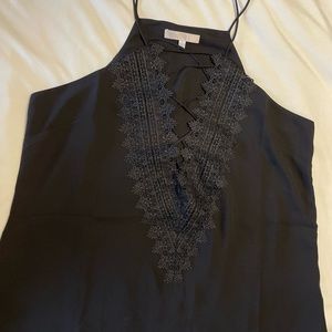 Black spaghetti strap tank. Lace front w/deep V.